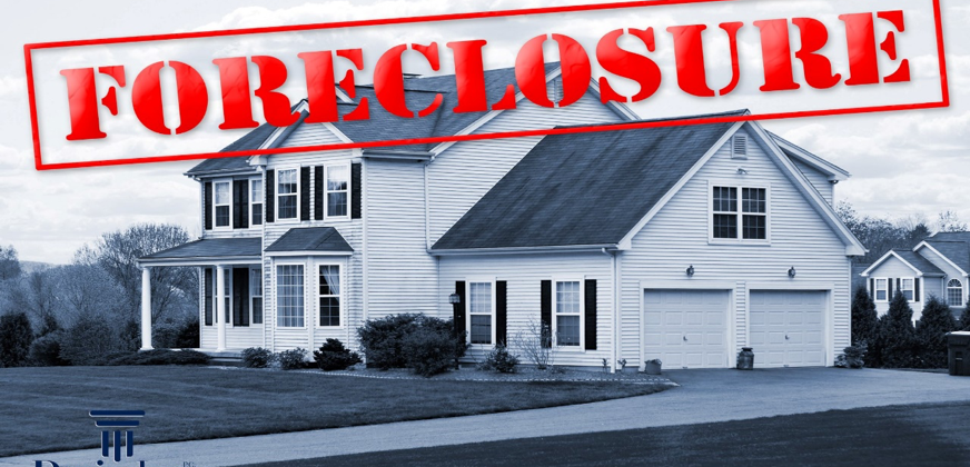 A house in grayscale with a red